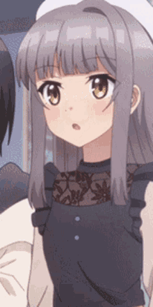 a girl with gray hair is wearing a blue apron and a white hat