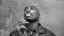 Tupac Smoking GIF - Tupac Smoking Smoke GIFs