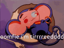 a cartoon mouse is laying on a plate with a fork and says comfie i 'm tirrreedddd