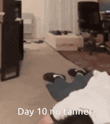 a person is laying on the floor with the words day 10 no tanner