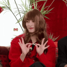 a person wearing a wig and a red jacket
