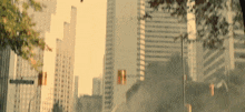 a blurred image of a city street with a sign that says ' a ' on it