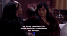 two women sitting on a couch with one saying my johnny he held my hand and he showed me around rome