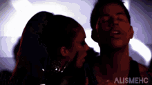 a silhouette of a man and a woman with the word alishmehc on the bottom left