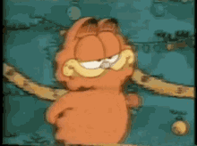 Garfield Shrug GIF - Garfield Shrug Idk GIFs