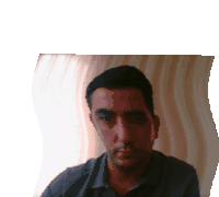 a man 's face is shown in a pixelated photo