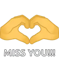 a pair of hands making a heart shape and the words miss you