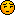 a pixel art of a smiley face with a serious expression .
