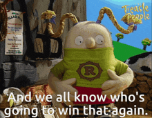 a cartoon character with a green shirt with the letter r on it