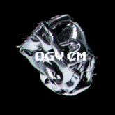 a black background with a silver object and the word melancholy in white letters