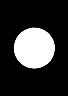 a white circle with a hole in it on a black background .