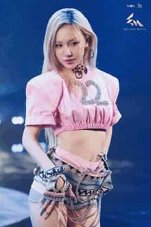 a woman wearing a pink shirt with the number 22 on it