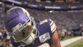 a football player wearing a helmet with the number 11