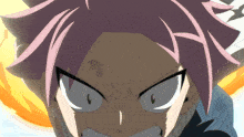 a close up of a person 's face with a very angry expression