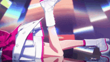a girl in a pink and white outfit is laying down with her legs crossed