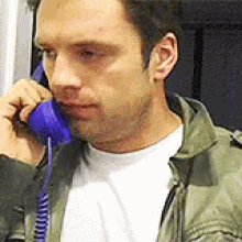 Sebastian Stan Phone GIF - Sebastian Stan Phone Landline GIFs