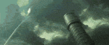 smoke coming out of a chimney in the sky