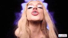 a close up of a woman 's face with the words created in wave video on the bottom right