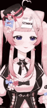 a girl with a sticky note on her forehead that says stinky