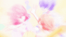 a blurred image of a person 's face with a pink and yellow background