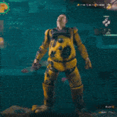 a man in a yellow robot costume is standing in front of a pizza place