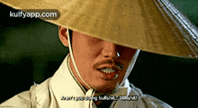 a man wearing a hat says " aren 't you doing bullshit ... bullshit "