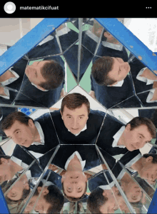 a man 's face is reflected in a kaleidoscope by matematikcifuat