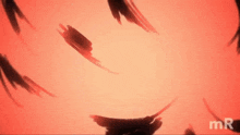 a red background with a drawing of a face and the word mr below it
