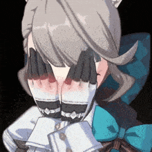a cartoon girl is covering her face with her hands in a video game .