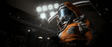 a person in a space suit is looking up at the sky