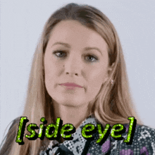 a close up of a woman 's face with the words [ side eye ] on it