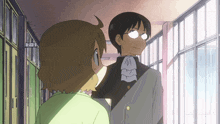 a man and a girl are standing next to each other in a hallway with lockers