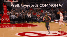 a basketball player with the number 3 on his jersey runs towards the basket