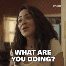 a woman says " what are you doing " while looking at the camera