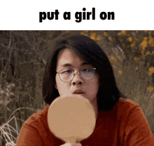 a man looking at himself in a mirror with the words put a girl on