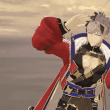 a man in a red and blue jacket is standing in the desert