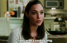 a woman says i also write a cooking blog while sitting on a couch