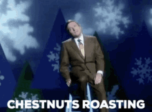 Ed Sullivan Chestnuts Roasting On An Open Fire GIF - Ed Sullivan Chestnuts Roasting On An Open Fire Mike Douglas GIFs