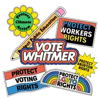 a bunch of stickers with one that says vote whitmer on it