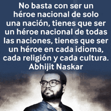 a man with glasses and a quote in spanish