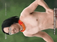 a shirtless man with glasses and a red scarf around his neck says i 'm ready to kick some brawn ass