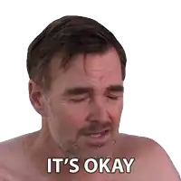 a shirtless man says it 's okay in white letters