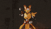 a person in a costume is holding a sword in front of flames