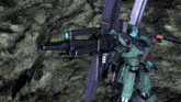 a green robot is holding a large gun and a sword