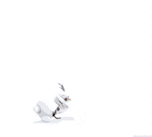 a snowman is laying on his back on a white background .