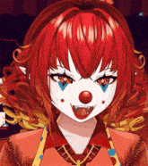 a girl with red hair and a clown costume on