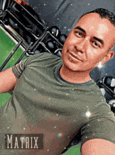 a picture of a man in a green shirt with the word matrix on the bottom