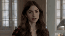Confused Emily Cooper GIF - Confused Emily Cooper Lily Collins GIFs