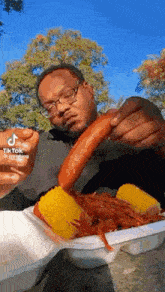 Meated Man Holding Big Sausage Up To Camera GIF - Meated Man Holding Big Sausage Up To Camera Freaky Sausage Man GIFs