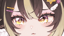 a close up of a girl 's eyes with a star in her hair